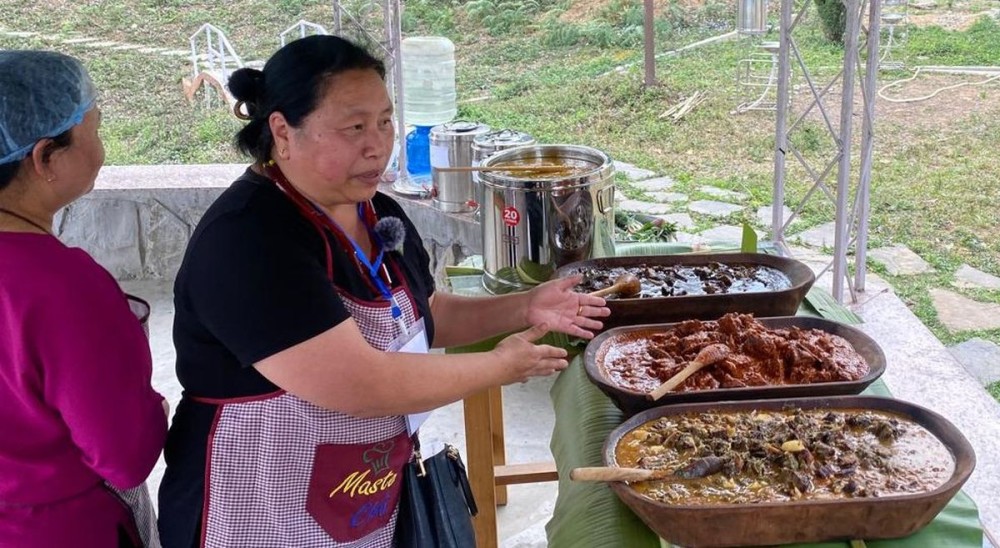 Prof V Hibo, Principal, Japfü Christian College showcasing indigenous cuisines